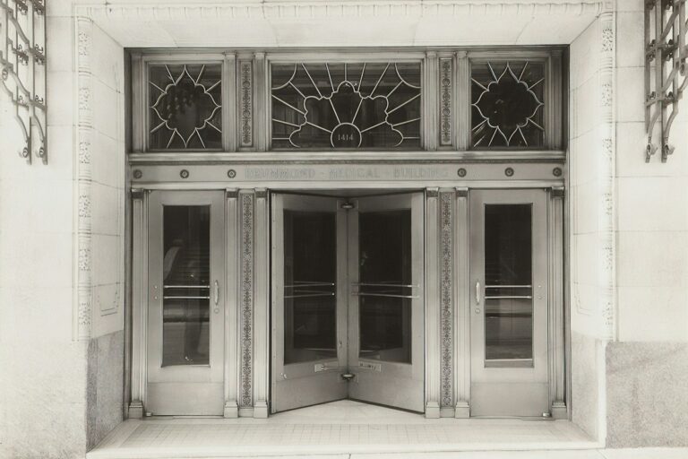 Art Deco Typography and Graphic Geometry: Visual Identity of the Roaring Twenties and Thirties Art Deco architectural facade with geometric gilded metalwork and vintage typography